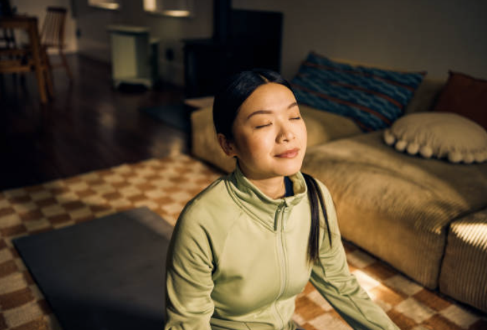 stress-resilient routine woman doing yoga in the morning
